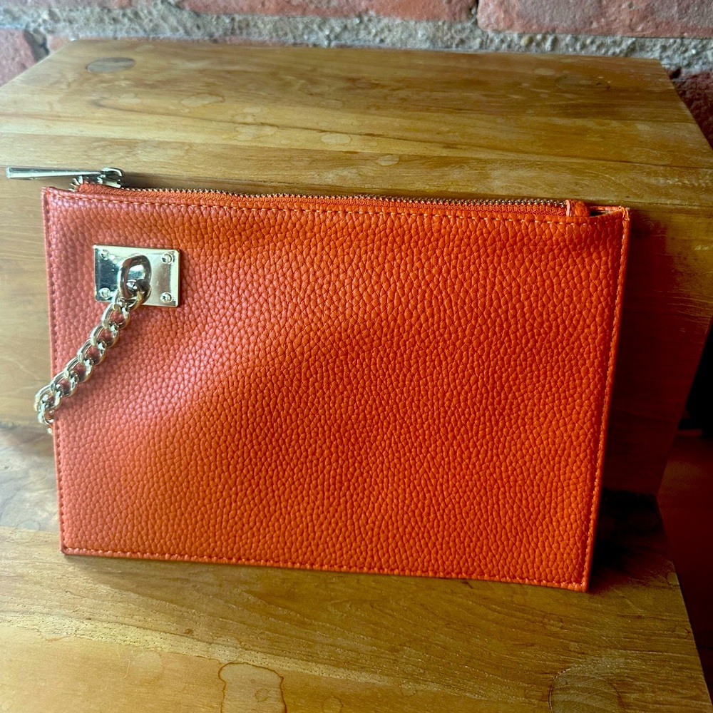 Sondra Roberts orange wristlet purse